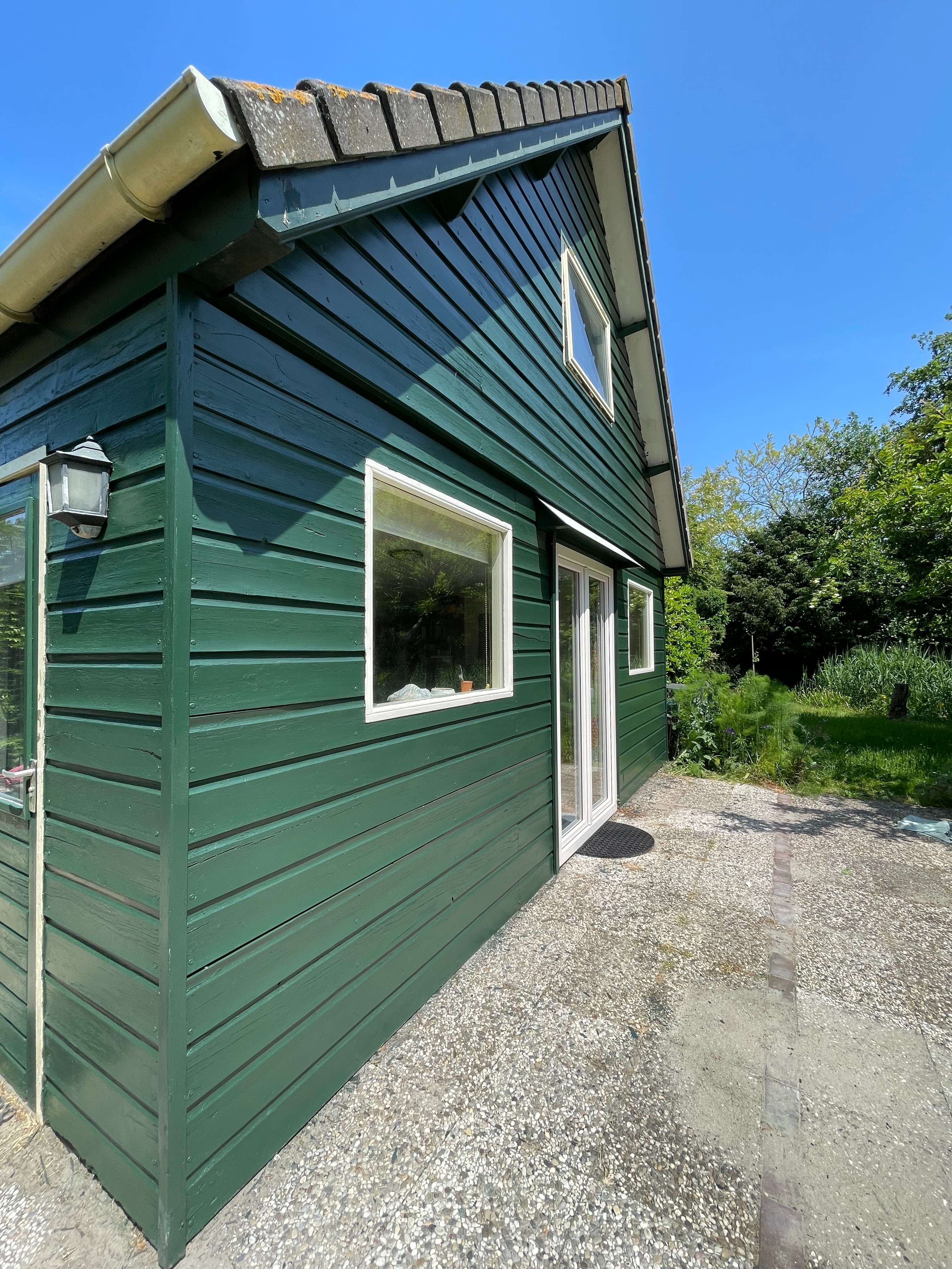 Tuinhuis geverfd